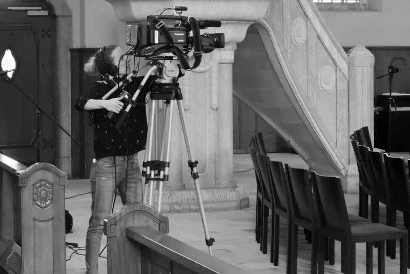 Alessia Giordano filming at a church